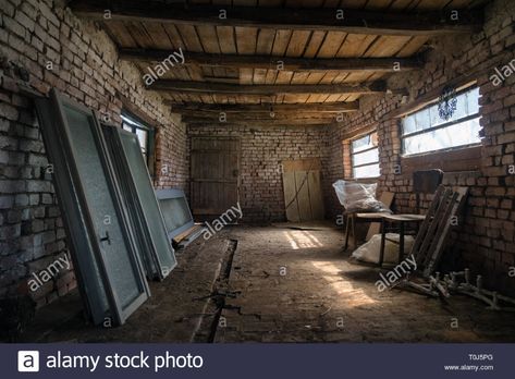 Old barn interior in the village. Vintage shed built of wood and brick, abandoned barn. Inside of a rustic stable Stock Photo Shed Homes Interior, Abandoned Room, Wood And Brick, Brick Shed, Shed Interior, Old Abandoned Houses, Barn Interior, Shed Homes, House Inside