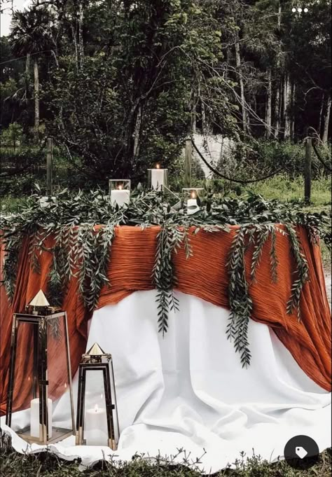 Boho Fall Centerpieces Wedding, Rust Wedding Reception Decor, Terracota Wedding Theme Centerpieces, White And Burnt Orange Wedding Table, Rustic Orange And Forest Green Wedding, Long Table Runner Ideas, October Farm Wedding, Rust And Green Wedding Decor, Rust And Cream Wedding