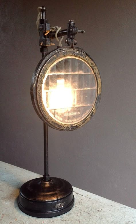 Headlamp Lens table lamp crafted of industrial parts and vintage auto headlamp lens - sold in San Diego, CA store Refurbish Ideas, Lampe Steampunk, Pipe Lamps, Old Car Parts, Men Cave, Steampunk Lighting, Diy Lampe, Steampunk Decor, Headlight Lens