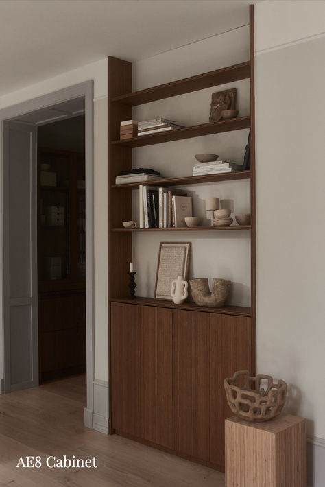 Our living room AE8 cabinet has a sleek and simple design with elegant folding doors. It is a perfect combination of a shelf and cabinet, allowing you to store your practical belongings and showcase any personal artifacts. The cabinet is a great way to utilize the space by having it freestanding or built in a niche and having the shelves go all the way up to the ceiling. Bamboo Cabinet, Norway House, Bamboo Cabinets, Recessed Shelves, Living Room Corner, Bookshelf Design, The Cabinet, Folding Doors, All The Way Up