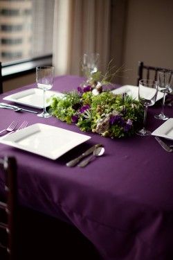 purple tablescape Purple Tablescape, Beer Bottle Centerpieces, Green Table Settings, Woodland Centerpiece, Dark Purple Wedding, Purple Tablecloth, Hopeful Romantic, Lilac And Green, Plum Wedding