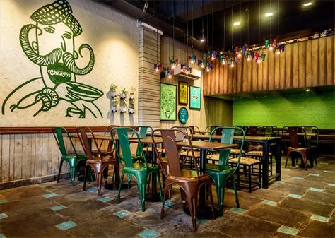 While the place is desi, it completely caters to the contemporary styling sensitivities.  http://www.decoinch.com/interior-review-chaayos-galleria/ Cafe Pictures, Food Delivery, Street Food, Desi, Stained Glass, Fair Grounds, Cafe, Restaurant, Glass