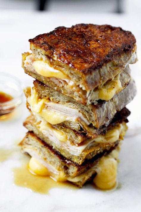 Monte Cristo Sandwich - This Monte Cristo Sandwich Recipe delivers on the gooey, savory perfection of grilled cheese and the sweetness of French Toast. Ready in 10 minutes from start to finish! Recipe, sandwich, grilled cheese, snack, brunch, breakfast, easy | pickledplum.com Monte Cristo Sandwich Recipe, Recipe Sandwich, Hot Sandwich Recipes, Cheese Snack, Monte Cristo Sandwich, Breakfast Easy, Hot Sandwich, Easy Asian, Easy Asian Recipes