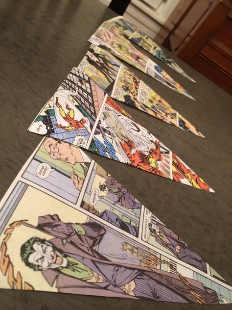 I like the banner made out of comic books Comic Book Theme Party, Dc Themed Party, Vintage Superhero Birthday Party, Heroes Vs Villains Party, Comic Decor, Adult Superhero Party, Comic Banner, Joker Party, Superhero Themed Party