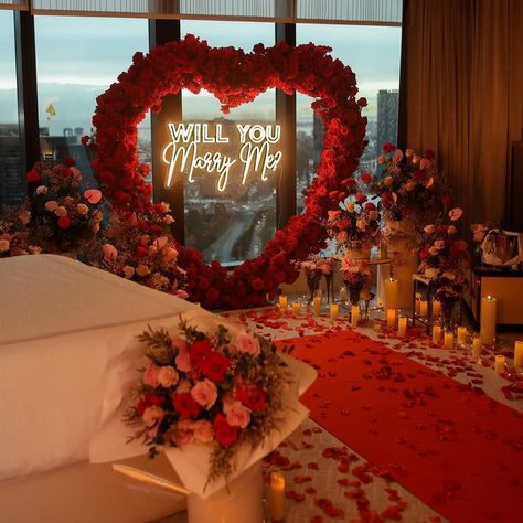 A heartfelt proposal amidst a breathtaking display of red and pink flowers at Crown Towers hotel—where love blossoms in an elegant setting 🌹 White Rose Proposal, Red Rose Engagement Party, Roses And Candles Proposal, Proposal Roses And Candles, Beach Proposal White Roses, Rose Beach Proposal, Room Surprise, Romantic Room Surprise, Dream Proposal