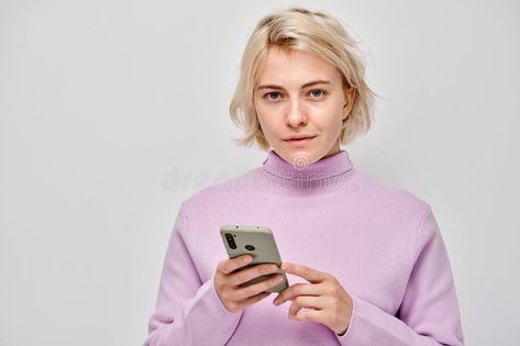 Portrait of young blond woman holding mobile phone in hand with happy smiling face. Person with smartphone royalty free stock image, #young, #ADVERTISEMENT, #hand, #Advertisement, #ad Blond Woman, Blank Background, Smiling Face, Female Images, Smile Face, Pose Reference, Stock Images Free, Photo Image, Mobile Phone