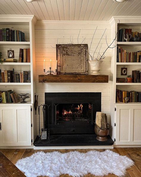 Hello simple & moody fireplace for winter 😍 . . . Josie starts her first ballet class tonight y’all & I’m crying 😭 🩰 . .… Bookshelves Near Fireplace, Fireplace In Bookshelf, Bookshelf By Fireplace, Bookshelf Around Fireplace, Bookshelves Next To Fireplace, Mantle Storage, Moody Fireplace, Bookshelves Around Fireplace, Basement Mancave