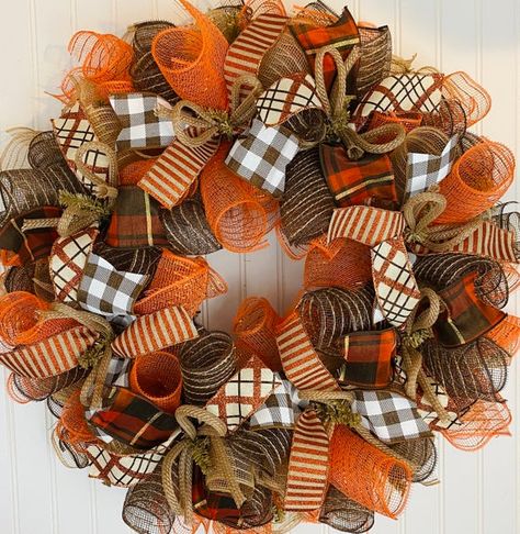 Get your door ready to impress all of your guests this fall with this wreath. This Fall harvest wreath will make a great statement on your door this season! Made with mesh in all the rich fall colors, designer ribbons in coordinating fall patterns, colors and textures and Accented with jute tubing. Wreath For Fall, Fall Mesh Wreaths, Fall Deco Mesh Wreath, Mesh Ribbon Wreaths, Deco Mesh Wreaths Tutorials, Easy Fall Wreaths, Fall Decor Wreaths, Fall Deco Mesh, Fall Decor Diy Crafts