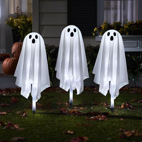 PRICES MAY VARY. Light-up Ghost: Set of 3 ghost Halloween pathway lights have white fabric cloth and spooky faces with black felt eyes and mouths. They cast fearful glow into the night, shining cool white color emanate through their ethereal sheets to level up the Halloween atmosphere. Glowing Halloween Props: Light up your haunted pathway with our ghost pathway marker. Best viewed during nights since they light up and emit a cool white ghastly glow with 8 lighting modes and 15 LEDs in total. Pe Light Up Ghost, Pathway Decor, Halloween Hanging Ghost, Glow Halloween, Ghost Decor, Fall Table Centerpieces, Hanging Ghosts, Ghost Lights, Creepy Halloween Decorations