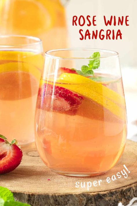 Let me introduce you to rosé wine sangria, the perfect summer drink that takes 10 minutes to prepare and lasts several hours, making it ideal for hot weather gatherings. It's a crisp and light twist on the classic sangria we all know and love. Pizza Rose, Rose Wine Sangria, Classic Sangria, Summertime Sangria, High Tea Baby Shower, Rosé Sangria, Boston Pizza, Pitcher Drinks, Rose Sangria