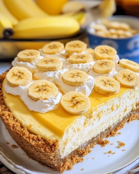 Banana Pudding Cheesecake 🍌🍰 Ingredients: For the Crust: - 2 cups graham cracker crumbs - 1/2 cup unsalted butter, melted - 1/4 cup granulated sugar For the Cheesecake Filling: - 24 oz cream cheese, softened - 1 cup granulated sugar - 3 large eggs - 1/2 cup sour cream - 1 tsp vanilla extract - 1/2 cup mashed ripe banana (about 1 large banana) For the Banana Pudding Layer: - 1 package (3.4 oz) instant banana pudding mix - 1 1/2 cups cold milk For the Topping: - Whipped cream - 2-3 bananas... Peanut Butter Banana Recipes, Lemon Posset Recipe, Healthy Banana Recipes, Banana Recipes Overripe, Instant Banana Pudding, Summer Pasta Recipes, Banana Snacks, Banana Treats, Pudding Cheesecake