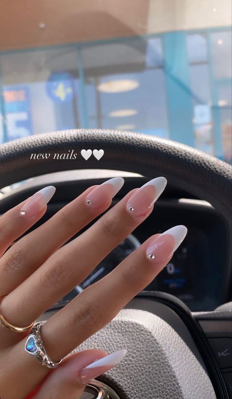 Nails Circle Shape, Cute Gem Designs On Nails, Birthday Nail Set Ideas Almond Shape, Single Gem Nails, French Tip With Rhinestones Almond, Round Nails With Rhinestones, Pageant Nails Ideas, Graduation Nails Acrylic 2024, Nails That Go With Royal Blue Dress