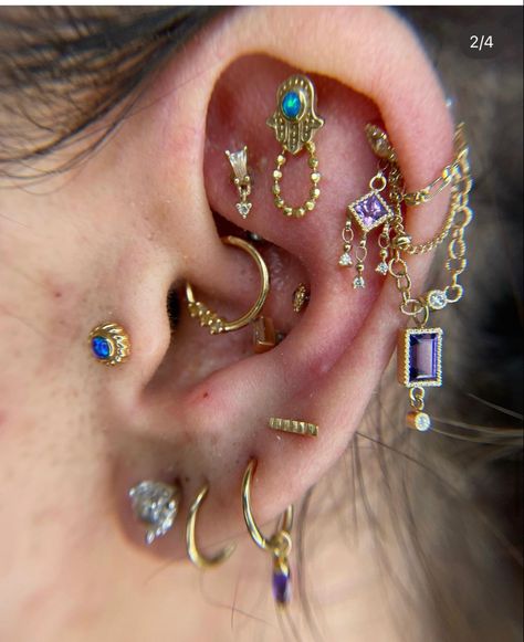 Ear Piercing Ideas For Big Ears, Witchy Ear Piercings, Maximalist Piercings, Colorful Ear Piercings, Maximalist Ear Piercings, Hippie Ear Piercings, Different Ear Piercings Chart, Multiple Ear Piercings Aesthetic, Hippie Piercings