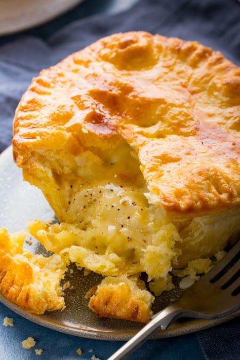 Buttery shortcrust pastry stuffed with a beautiful gooey cheese, potato and onion filling. A fantastic meat-free pie and comforting dinner. Alfie Boe Most Recent, Cheese And Onion Pie, Pie Images, Savory Pastries, Kitchen Sanctuary, Dinner Pies, Savoury Pies, Onion Pie, Cheese Potato