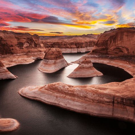 Backpacking to Reflection Canyon is not for the faint of heart. It is an incredibly challenging 20-mile round-trip hike through the Glen Canyon backcountry for one view into Reflection Canyon. Reflection Canyon is an extension of Lake Powell, and it is usually seen by boat and plane, though this intense hike is starting to gain more popularity as of late. Its location was revealed in 2006 when National Geographic published photographer Michael Melford's photos of the canyon. Utah Bucket List, Glen Canyon, Escalante National Monument, Backcountry Camping, Canyon Lake, Lake Powell, Snowy Mountains, Backpacking Travel, Incredible Places