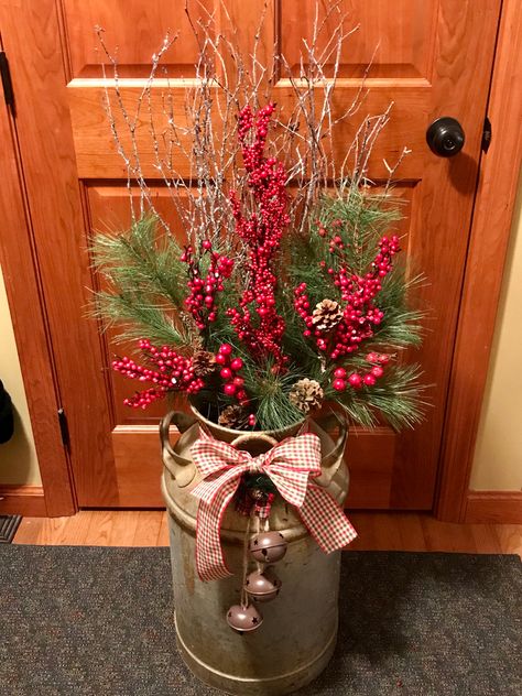 A family milk can that I just decorated today!  I also put mini lights on it! Natal Country, Porch Pots, Outdoor Christmas Planters, Glam Christmas Decor, Farmhouse Glam, Christmas Planters, Glam Christmas, Country Christmas Decorations, Christmas Porch Decor