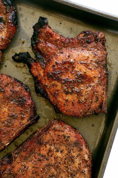 An overhead view of Smoked Pork Chops on a sheet pan. They are crispy around the edges. Pork Chop Brine Recipes, Boneless Prime Rib Recipe, Pork Chop Brine, Roasted Okra, Perfect Pork Chops, Smoked Pork Chops, Easy Pork Chops, Prime Rib Recipe, Budget Friendly Dinner