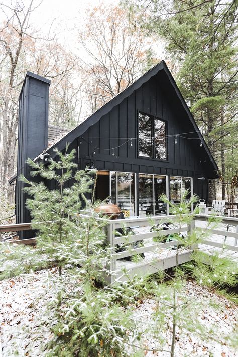 Our Wisconsin Chalet Style Cabin #cabin #chalet #Wisconsin #aframe #blackcabin #black #cozy #northwoods Charcoal A Frame House, Cabin Style Exterior, Black Cabin In The Woods, Modern Mountain Cabin Exterior, Mountain Cabin Modern, Chalet Exterior Design, Black Lake House, Cabin Building Plans, Mountain Cabin Exterior