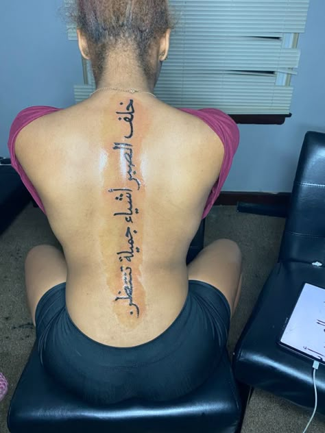 Spine Tattoos For Women Arabic Writing, Back Tattoo In Arabic, Arabic Tattoo Quotes For Women Spine, Arab Spine Tattoo, Back Tattoo Women Spine Meaningful Japanese, Arabic Tattoo Back Spine, Baddie Spine Tattoo With Meaning, Arabic Tattoo Quotes For Women On Back, Spine Tattoos For Women Japanese Letters