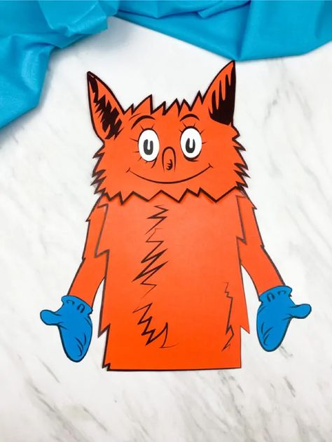 If you're looking for a fun and easy pre k craft for kids to make, this Fox in Socks puppet is great! Make it for Dr. Seuss's birthday or for Read Across America Day. Download the free printable template today.#simpleeverydaymom #prekcrafts #prekindergarten #prek #kidscrafts #craftsforkids #classroom #drseusscrafts #drseuss Fox In Socks Craft, Dr. Seuss Crafts, Paper Bag Puppet Craft, Socks Craft, Fox In Socks, Bag Puppet, Dr Seuss Activities, Dr Seuss Crafts, Puppet Craft