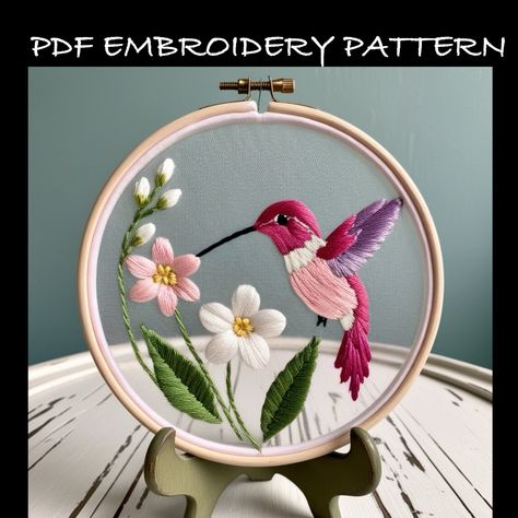 Hand Embroidery pattern template for a Hummingbird with floral elements. The pattern is available in 3.4,5,6,7,8 and A4 sizing to fit a variety of embroidery hoops. This digital download is for the pattern only as no instructions are included for stitching or for thread types or colors other than the reference photo of the design. What's Included  🪡 Digital PDF file suitable for printing at home or at a copy shop 🪡 Basic stitches for embroidery "how-to" sheet 🪡 How to transfer designs using 1 Sewing Birds Pattern, Hummingbird Embroidery Pattern Free, Bird Hand Embroidery, Embroidered Hummingbird, Embroidery Birds, Simple Hand Embroidery Patterns, Birds Embroidery Designs, Basic Stitches, Diy Embroidery Designs