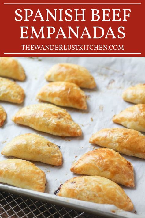 Spanish Beef Empanadas offer a delightful blend of buttery crust and spiced beef filling. These baked empanadas are perfect for appetizers, snacks, or any meal that demands a touch of savory goodness. Spanish Beef Empanadas, Best Empanada Filling, What To Serve With Empanadas, Mexican Beef Empanadas, Beef Empanada Filling Recipe, Biscuit Empanadas, Baked Beef Empanadas Recipe, Meat Empanadas Recipe, Shredded Beef Empanadas