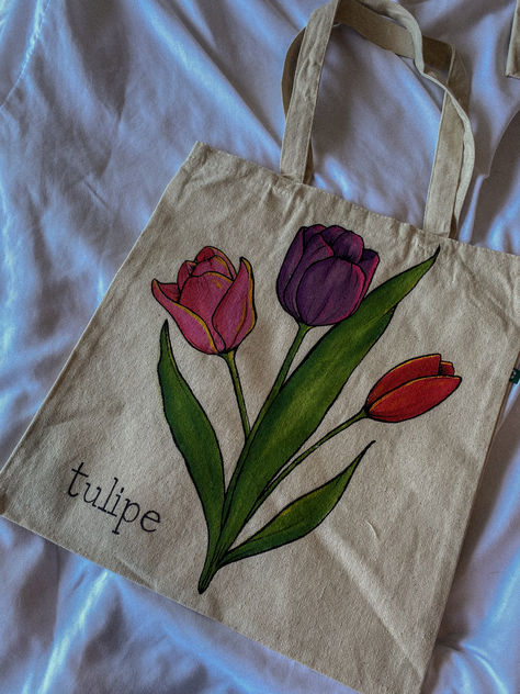 #totebag #tote #handmade #handpainted #custom #customart #handbag #totes #tulipe #tulips #flowers #farmersmarket #aesthetic #cutetote #giftidea #cute #summer #vibes #summervibes Toat Bag Painting, Painted Tote Bag Aesthetic, Totebag Lukis, Handpainted Totebag, Tote Bag Painting Ideas Aesthetic, Easy Tote Bag Painting, Toat Bag, Totebag Painting, Diy Totes