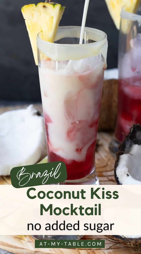 Want a refreshing drink without added sugar? Try this Brazil-inspired Coconut Kiss Mocktail. It’s naturally sweet with fruit juices and layered with coconut cream, pineapple, cherry, and lime. Dairy-free and gluten-free, it’s perfect for everyone. Coconut Cream Mocktail Recipe, Coconut Milk Mocktail Recipe, Coconut Drinks Nonalcoholic, Ovulatory Recipes, Drinks With Coconut Milk, Coconut Milk Drinks, Coconut Mocktail, Lychee Mocktail, Kiss Cocktail