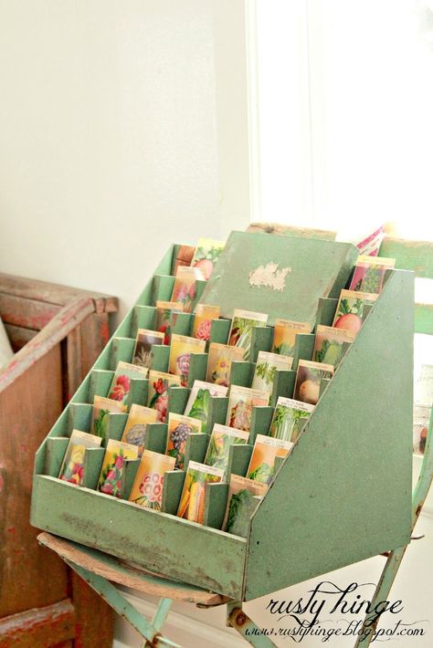 Vintage seed packet display - these are pretty pricey - cheapest I've seen come in at $300 Seed Collection Storage, Seed Packet Display, Vintage Seed Packet, Seed Library, Seed Storage, Vintage Seed Packets, Rose Nursery, Seed Box, Craft Booth Displays