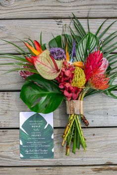 Tropical Silk Flower Arrangements, Tropical Hand Bouquet, Tropical Flowers For Wedding, Lavender Tropical Wedding, Palm Leaf Bridesmaid Bouquet, Beach Wedding Flowers Tropical Bridal Bouquets, Tropical Flowers Wedding Decor, Modern Tropical Wedding Flowers, Tropical Bohemian Wedding