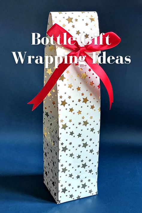 Gift wrapping ideas for tumbler. Wine Bottle Gift Box Diy, Diy Wine Bottle Gift Bags, How To Make A Wine Bottle Gift Bag, Wrap A Wine Bottle With Wrapping Paper, How To Pack Bottles Gift Ideas, How To Wrap Water Bottle, Water Bottle Wrapping Ideas, Gift Wrap A Wine Bottle, Wrapping Water Bottles Gift