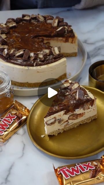 Jane Dunn on Instagram: "Twix Cheesecake 🤤😲 Recipe 👇  Who loves a Twix?! I absolutely love them, and you know how I feel about cheesecakes, so this recipe was a no brainer!  It was originally based on my Rolo cheesecake recipe so it’s a simple no-bake cheesecake with a classic biscuit base, a caramel Twix filling, chocolate ganache on top and lots more Twix decor! 😍  Which chocolate bar would you choose for your ideal cheesecake?! 🍫  ❣️Biscuit Base❣️ ■ 300g digestives  ■ 150g unsalted butter   Cheesecake Filling ■ 500g full fat cream cheese ■ 100g icing sugar ■ 150g caramel  ■ 300ml double cream ■ 200g Twix   Ganache ■ 100g dark chocolate  ■ 100ml double cream  Decorations ■ 200g Twix  ■ Caramel drizzle  ❣️Method ❣️ ■ Mix blitzed biscuits with melted butter  ■ Press into the base of a Twix Cheesecake Recipe No Bake, Twix Cheesecake, Twix Cheesecake Recipe, Caramel Swirl Cheesecake, Toffee Crunch Cheesecake, Giant Twix Cheesecake, Rolo Cheesecake, Easy No Bake Cheesecake, Cheesecake Bites