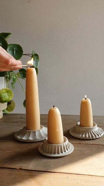 Hilda Carr Pottery on Instagram: "Lots of new things out of the kiln this morning including a few of these candle plates. They'll be available 👉🏻 THIS THURSDAY 17TH at 7pm 👈🏻 (hooray!) And there'll be the option to purchase them with or without a pair of these gorgeously chunky beeswax candles. - - #hyggehome #ceramics #myhomestyle #myhomevibe #myscandihome #pottery #handcarved #handmadeceramics #handmadepottery #wheelthrown #shopsmall #justacard #wearethemakers" Hand Built Pottery Candle Holder, Candle Holder Ceramics, Pottery Without A Wheel, Pottery Candle Holders Ideas, Creative Ceramics Ideas, Candleholder Ceramic, Chunky Candle Holders, Diy Candle Stick Holder, Ceramic Candles