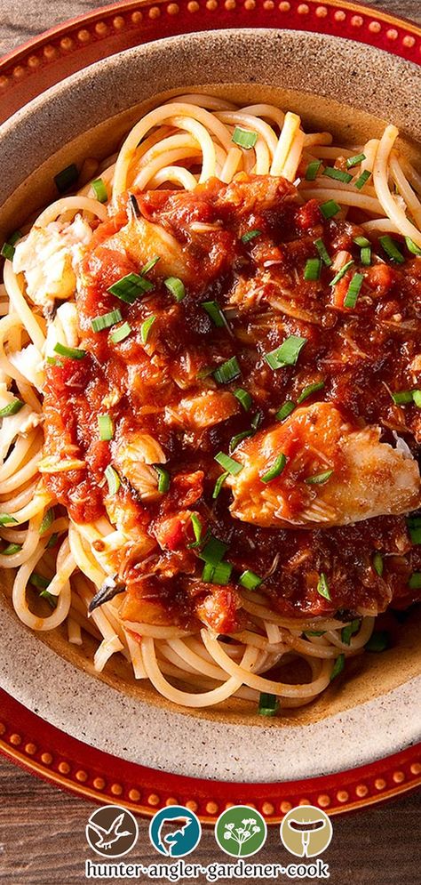 Crab and tomato go together like cats and random things tossed onto the floor. That is to say that crab and any form of tomato play well together, from a simple salad with freshly chopped tomatoes to this spaghetti with crab sauce. This sauce is insanely good. Good in the way only years of tinkering can do. Sharp, sweet, garlicky, just a little spicy with a strong hit of anise flavor from fennel and ouzo. | @huntgathercook #hankshaw #crabpastasauce #crabpasta #crabspaghettisauce #seafoodsauce Red Crab Sauce For Pasta, Crab Gravy, Crab Sauce Recipe, Crab Pasta Recipes, Crab Spaghetti, Crab Sauce, Recipe For Spaghetti, Red Sauce Recipe, Crab Pasta