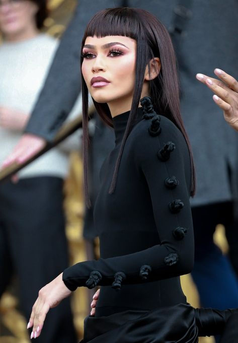 Micro Bangs & Black Crepe: Zendaya Debuts Daring Style at Schiaparelli Show Zendaya Bangs, Zendaya Movies, Micro Bangs, Zendaya Hair, Zendaya Style, Entertainment News Celebrities, Clueless Outfits, Christian Louboutin So Kate, Feminine Chic