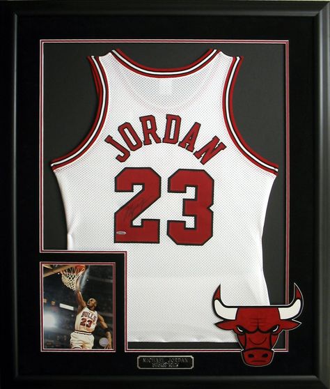 Michael Jordan autographed and framed jersey with photo and plate. #ChicagoBulls #Jordan #jerseys #Bulls #NBA Sport Jersey Display Ideas, Basketball Jersey Frame, Framed Basketball Jersey, Frame Jersey Ideas, Sports Jersey Display, Jersey Frame, Framed Memorabilia, Michael Jordan Autograph, Nba Basket