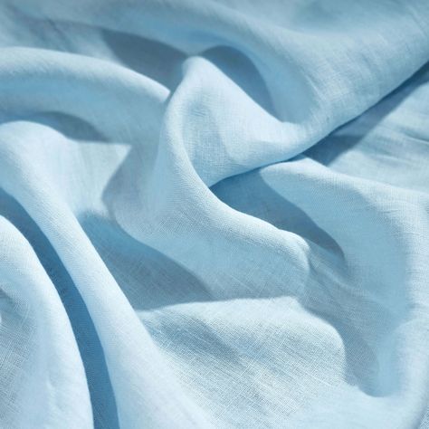 Our 100% Light Sky Blue Linen Fabric is expertly woven from sustainable European flax then stonewashed to add ultimate softness to the natural linen you know and love. Crafted in Europe to OEKO-TEX® standards and intentionally created to last, this fine quality linen makes one of the best fabrics for dress making, curtains, cushions, bedding, tablecloths, napkins and other home textiles. Composition: 100% natural European linen Weight: 205 g/m² or 6.05 oz/yd² Width: 145 cm or 57" Country of orig Light Blue Color Swatch, Light Blue Fabric Texture, Linen Swatch, Cushions Bedding, Light Blue Curtains, Blue Fabric Texture, Baby Blue Fabric, Sky Blue Fabric, Making Curtains