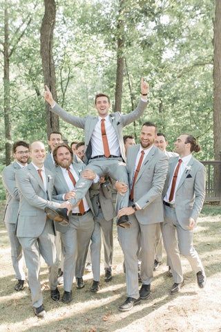 Grey Suit With Copper Tie, Grey And Rust Wedding Party, Cinnamon And Grey Wedding, Grooms Tux Fall Wedding, Light Grey Suit Fall Wedding, Earth Tone Groomsmen Attire, Grey Suit With Rust Tie, Fall Wedding Grey Suits, Rust And Gray Wedding