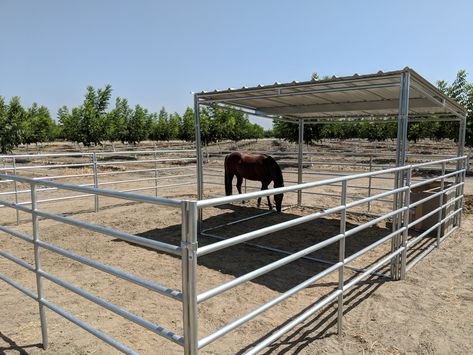 KRE Value Shelter Kit $999 12x12 Perfect for covering in horse pen, arena  All modular shelters made with USA Galvanized steel  Contact us for more details Horse Pen Ideas, Horse Pasture Shelter, Simple Horse Barns, Round Pens For Horses, Pasture Shelter, Horse Shelters, Cattle Gate, Horse Pens, Horse Shed