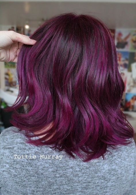 Plum passion purple magenta pink red hair colour changing color ideas wavy bob mid length hair deep bright color fue ideas girls women’s salon ‍♀️ Cherry Red Hair With Purple Highlights, Muted Magenta Hair, Purple Hair Shoulder Length, Short Purple Red Hair, Berry Hair Color Plum, Magenta And Brown Hair, Magenta Bob Hair, Purple Magenta Hair, Hair Color Mid Length