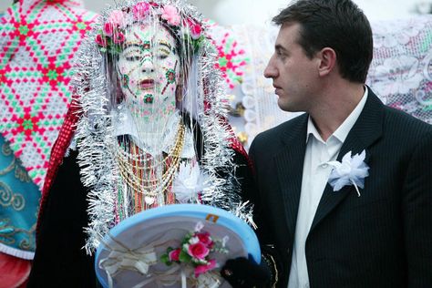 A Bulgarian bride from the Pomak minority (ethnic Bulgarian speaking Muslims), is seen during the traditional, centuries old preparation for her two-day wedding ceremony in the village of Ribnovo some 210km from the capital Sofia on 24 January, 2010. The mountain village is famous for performing the unique wedding ceremonies in winter time only Visual Anthropology, Bulgarian Wedding, Slavic Design, Bride Looks, Bright Wedding Colors, Wedding Day Checklist, Mexican Wedding Dress, Chinese Wedding Dress, Japanese Wedding