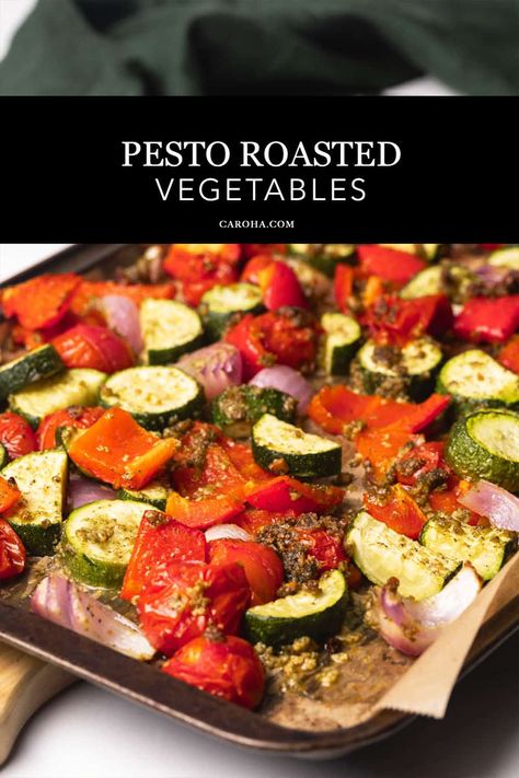 Pesto roasted vegetables on a baking sheet next to a green tea towel. Pesto Roasted Vegetables, Pesto Vegetables, Pesto Pasta Dishes, Roasted Mediterranean Vegetables, Pasta Toppings, Homemade Pesto Recipe, Roasted Vegetable Pasta, Creamy Pesto Sauce, Leafy Salad