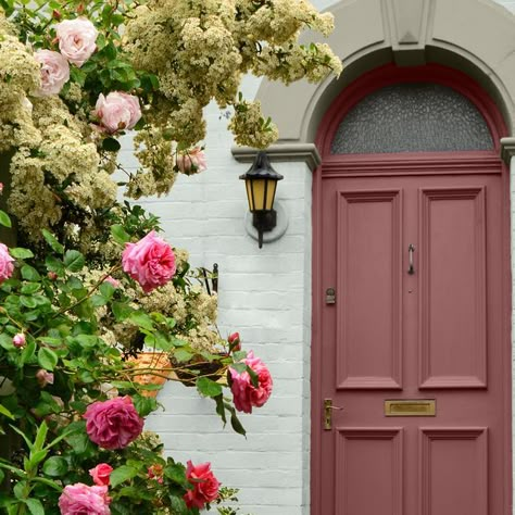 Colourtrend on Instagram: "What better way to welcome guests into your home than our heart-warming shade #PinkChocolate? Check out our latest blog over on The Trend, linked in our bio, where we talk through the latest trends in front door colours. Door: #PinkChocolate Main Walls: #PortlandDock Arch: #SpingTide #Colourtrend #AnyColourEveryFinish #ExteriorInspiration #Exterior" Dark Pink Front Door, Pink Front Door Tan House, Victorian Front Door Colours, Pastel Front Door, Pink Interior Door, Magenta Front Door, Light Pink Front Door, Mauve Front Door, Pink Door Exterior