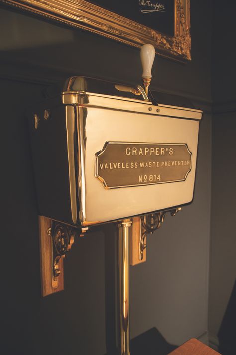 Thomas crapper brushed brass cistern against a black background Gothic Bathroom Ideas, Art Nouveau Bathroom, Washroom Ideas, Thomas Crapper, Gothic Noir, Gothic Bathroom, Private Museum, Downstairs Loo, Toilet Cistern