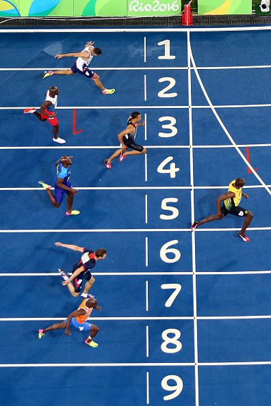 Usain Bolt of Jamaica celebrates after crossing the finish line to win the Mens… Usian Bolt, Crossing The Finish Line, Olympic Track And Field, Field Athletes, Running Track, Rio Olympics 2016, Usain Bolt, Rio Olympics, Olympic Sports