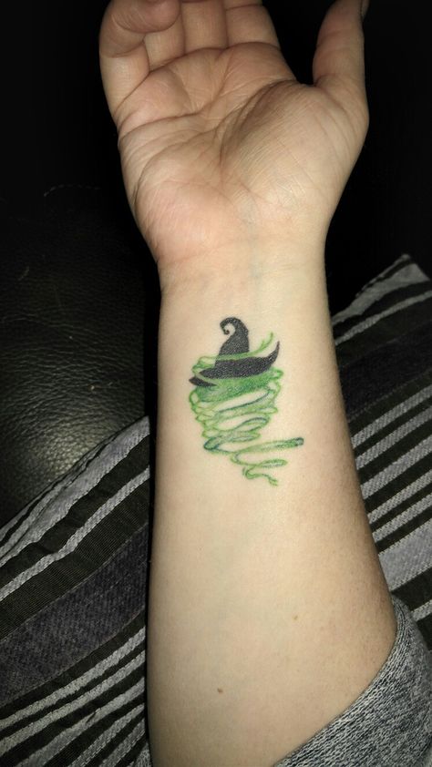 Wicked Witch of the West tattoo Elphaba Tattoo Ideas, Wicked Defying Gravity Tattoo, Wicked Movie Tattoo, Matching Wicked Tattoos, Wicked The Musical Tattoo, Wicked Tattoo Designs, Defying Gravity Tattoo, Wizard Of Oz Tattoo Ideas, Elphaba Tattoo