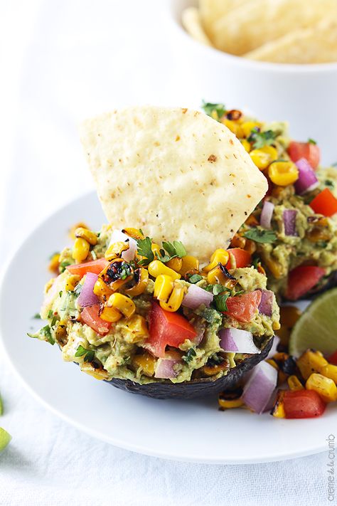 Easy fiesta guacamole stuffed with roasted corn, flavorful spices, and a hint of lime! Corn Appetizer, Roasted Corn, Guacamole Recipe, Yummy Dips, Mexican Dishes, Appetizer Snacks, Food For Thought, Summer Recipes, Finger Foods