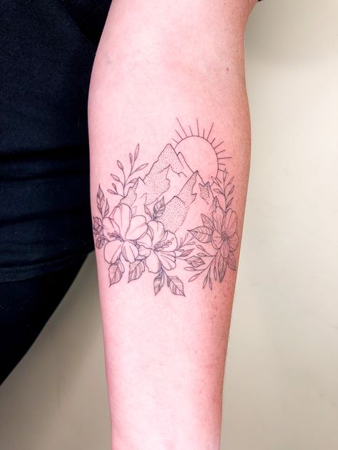 Mountain Back Of Arm Tattoo, Mountain And Floral Tattoo, Montana Mountains Tattoo, Mountain Thigh Tattoo Women, Mountain Arm Tattoo Women, Mountain Tattoo Bicep, Mountain Floral Tattoo, Mountain Wildflower Tattoo, Floral Mountain Tattoo