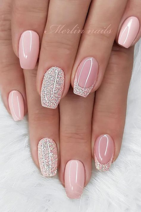 These ballerina nails feature a soft pink base, exuding a touch of elegance. Complementing the delicate color are two nails fully encrusted with sparkling pink glitter, adding a dash of glamour to the overall look. The glossy finish on the pink base nails and the textured glitter make for a sophisticated manicure perfect for any occasion.  // Photo Credit: Instagram @merlin_nails Nails Shimmer Sparkle, French Nail Designs Ballerina, Pink Elegant Nails Classy, Short Gel Nails With Glitter, Pink Ombre Shellac Nails, Soft Pink Ballerina Nails, Ballerina Nails Short Summer, Bridesmaid Manicure Ideas, Soft Pink Nails Gel