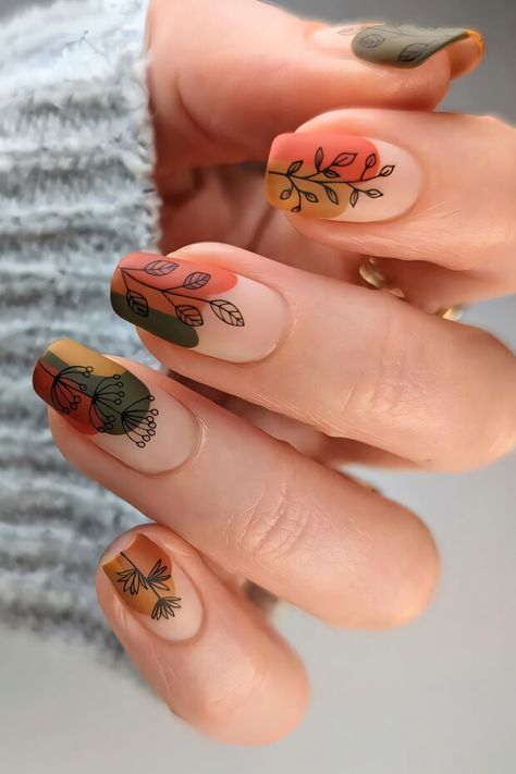 Orange, pink, and brown nails with leaves and flowers Fall Nail Art Square Nails, Fall Nails With Black, Southwest Nail Designs, Leaves Nails, Autumn Leaves Nails, Leaves Nail Art, Fall Nails With Leaves, Fall Floral Nails, Boho Nail Designs